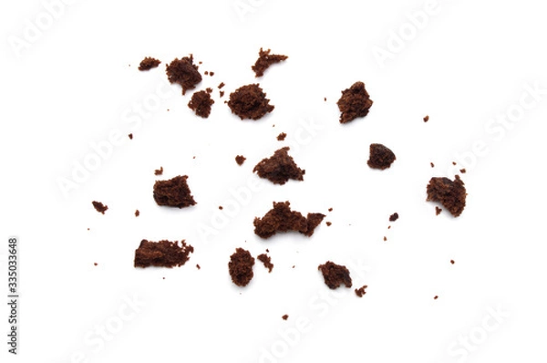 Obraz Crumbs of Chocolate brownie with sliced almond nuts toppings isolated on white background.