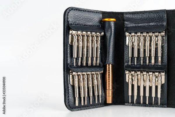 Fototapeta Unbranded mini torx and screwdriver kit photographed in studio and isolated on white background. Product photography, tools and reparation concept.
