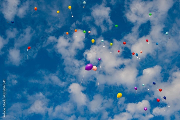 Fototapeta Colorful ballons flying into the air