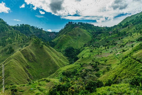 Obraz Amazing green Lake toba tall slopes with Sipiso Piso waterfall far away