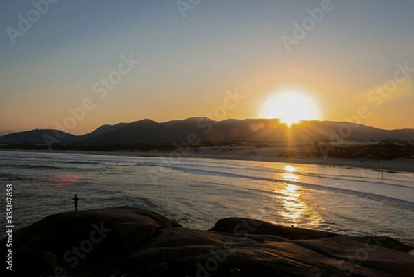 Fototapeta Sunset view from the rocks