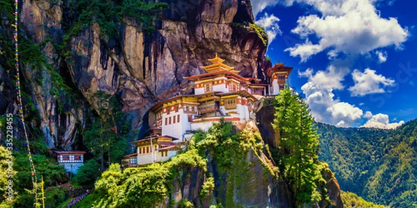 Fototapeta Panorama view of Tiger nest monastery on a bright bluesky day, Taktshang Goemba, Paro, Bhutan