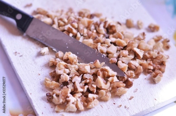 Obraz chopped walnuts for a cookie recipe
