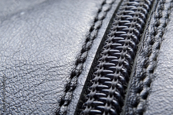 Obraz Lightning on a black leather texture.