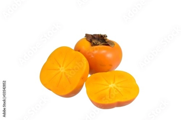Fototapeta Sharon persimmon fruit sliced on white background