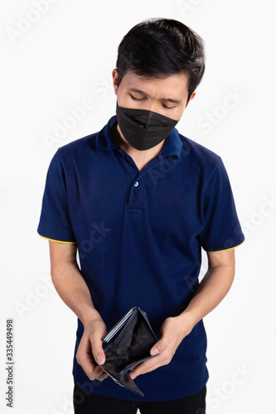 Obraz Protection against contagious disease, coronavirus. Man wearing hygienic mask to prevent infection, airborne respiratory illness such as flu, 2019-nCoV. He lost money purchase protection gear COVID-19