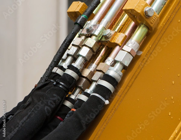 Fototapeta Hydraulik-Verbindung an einer Baumaschine