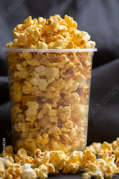 Obraz Popcorn in a large bucket.