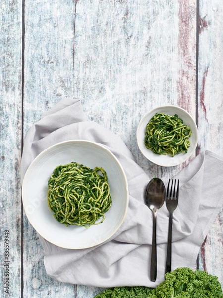 Obraz Pasta with vibrant green kale pesto