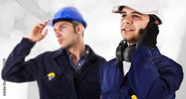 Fototapeta Two engineers in a construction site