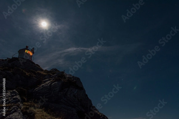 Obraz lighthouse at night 