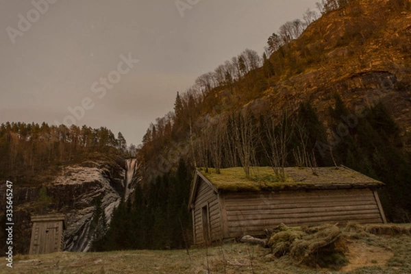 Obraz old abandoned houses with waterfall 