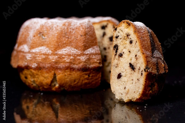 Obraz Cake, raisins, black background 11