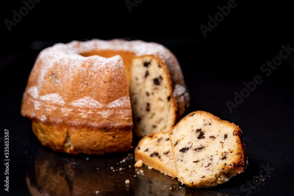 Obraz Cake, raisins, black background 08