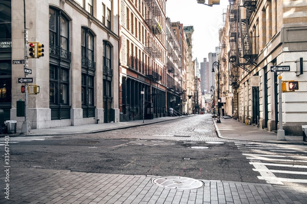 Fototapeta Empty street at sunset time in SoHo district in Manhattan, New York