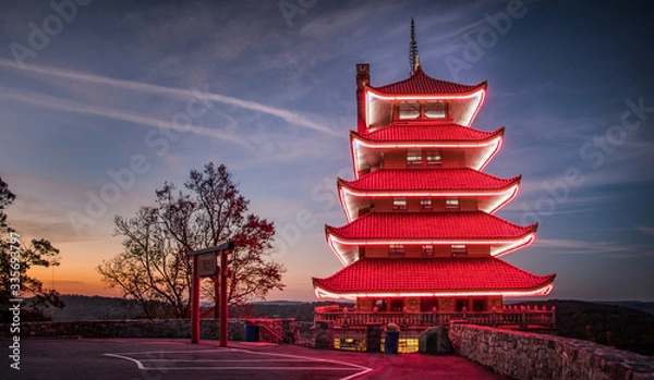 Fototapeta Reading Pagoda lit up as dawn approaches
