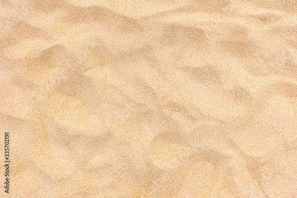 Fototapeta Background and texture, Top view of beach sand texture as background. sand in summer sun.
