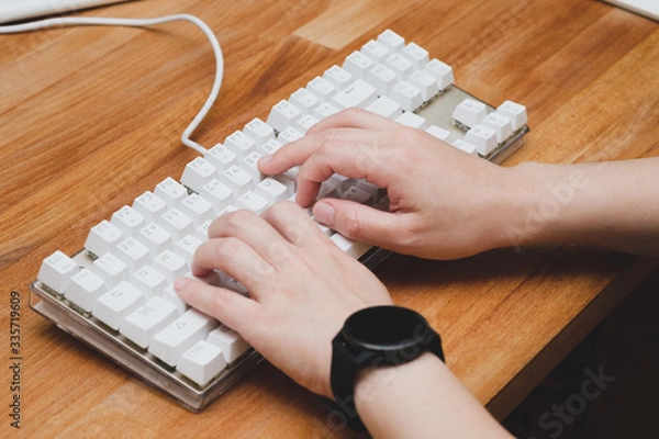 Obraz hands typing on keyboard