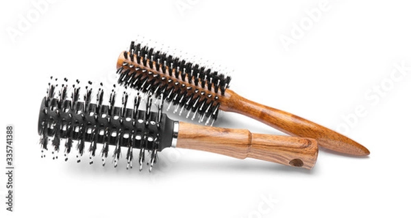 Fototapeta Hair brushes on white background