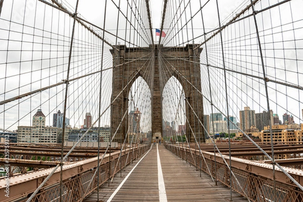 Fototapeta Landscape view of empty Brooklyn Bridge in New York City, empty streets due Covid-19 coronavirus pandemic, USA