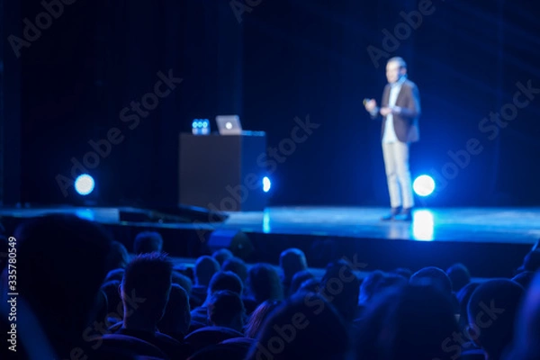 Fototapeta Audience listens lecturer at workshop