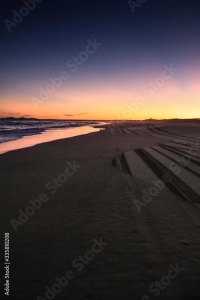 Obraz Zachód słońca i samochód