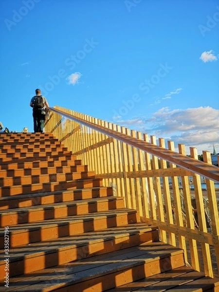 Fototapeta checked pattern on the stairs casted by sunset
