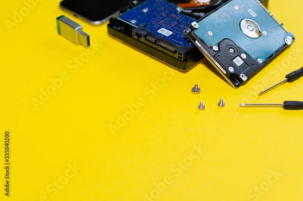 Fototapeta hard drives, laptop and replacement tools