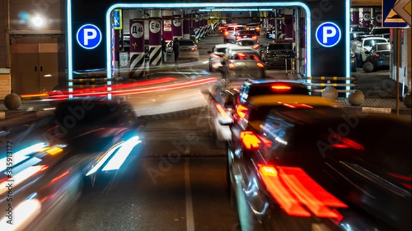 Obraz cars in queue at entrance in underground parking of hypermarket