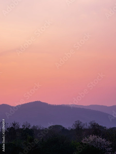 Fototapeta atmosphere before the sun rises on the mountain.