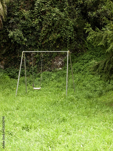 Obraz Old and abandoned children's swing