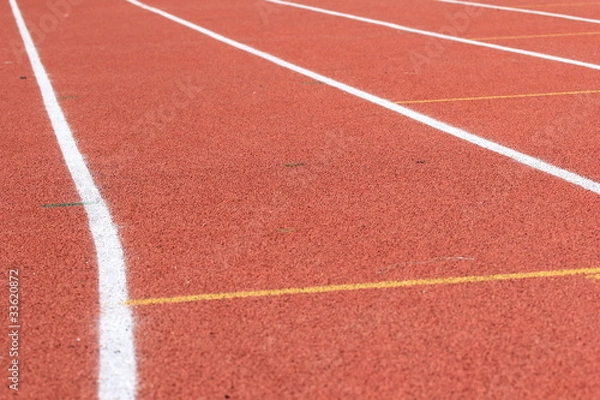 Fototapeta Беговая дорожка с разметкой на легкоатлетическом стадионе