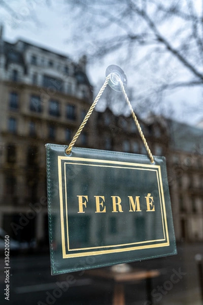 Obraz Sign at a shop window with the french text: "Ferme" that means "Closed"