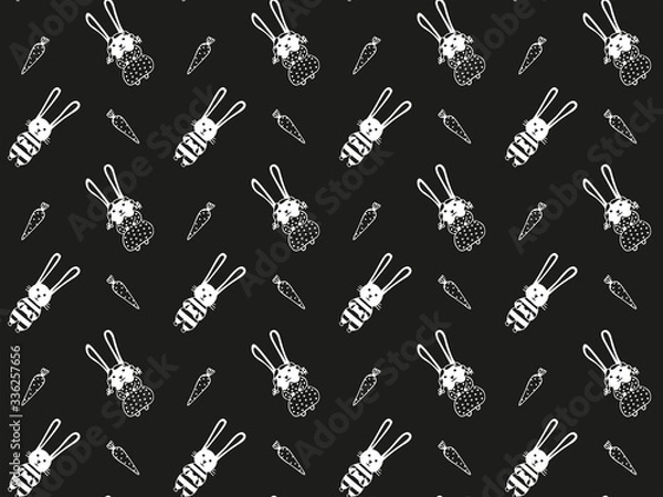 Obraz Seamless pattern of kids boys and girls rabbits in striped overalls and dresses with polka dots and carrots. Scandinavian style. White outlines on a black background. Cute trendy unisex design. Vector