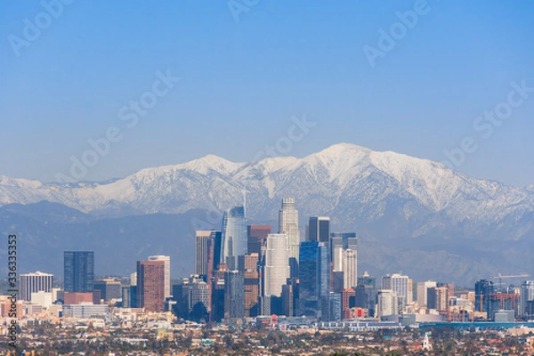 Fototapeta Downtown Los Angeles Skyline from Afar with Snowy San Gabriel Mountains