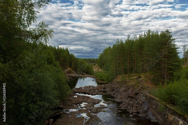 Fototapeta mountain river between sheer cliffs . blue clear water of the river.