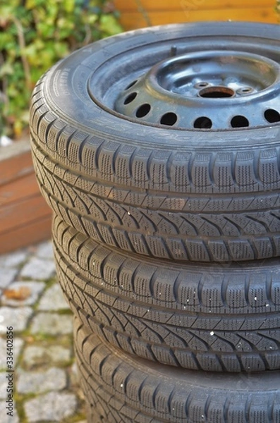 Obraz stack of car tires in the backyard