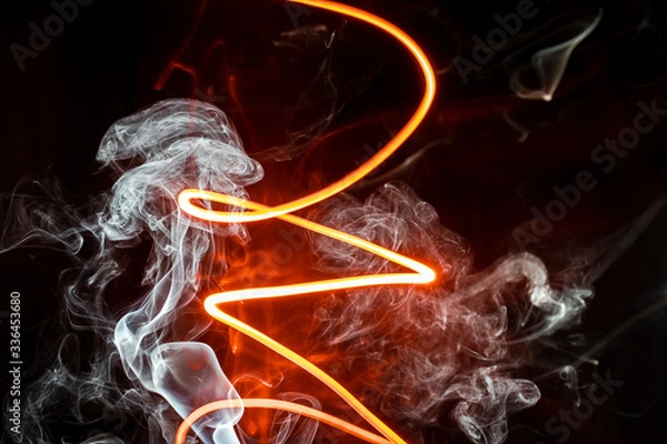 Fototapeta puffs of white and red smoke with a black background
