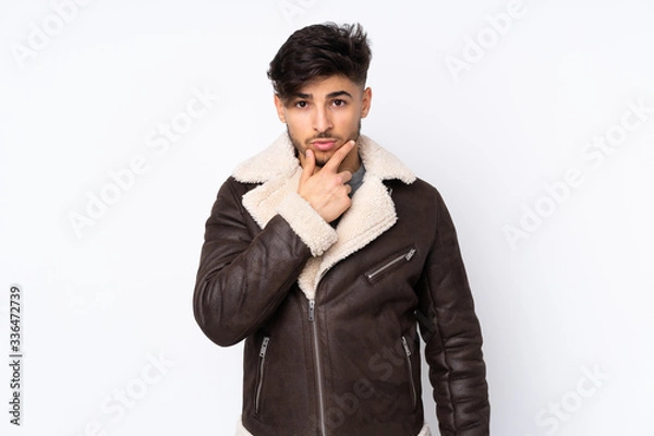 Obraz Arabian handsome man over isolated background thinking