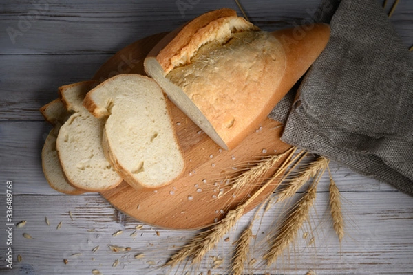 Obraz Fresh homemade white wheat bread. Top view.