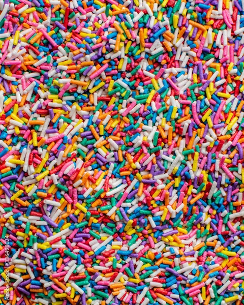 Fototapeta Background abstract texture colorful sprinkles sugar candy macro
