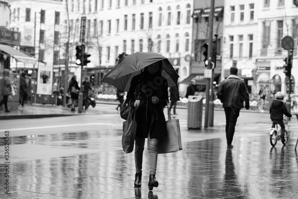 Fototapeta people walking in the rain