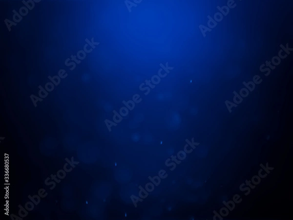Fototapeta Blue bokeh on a dark background. Blur the background and wallpaper