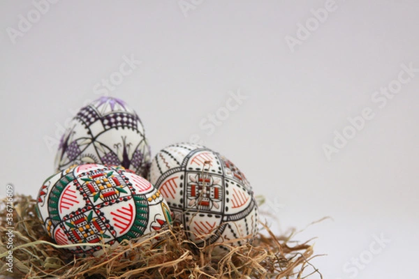 Obraz Traditional painted handmade Easter eggs on hay