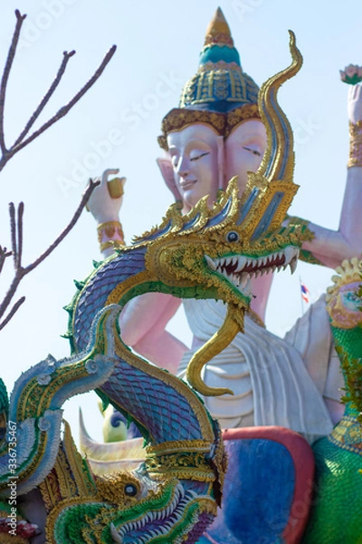 Fototapeta A beautiful view of buddhist temple Wat Saeng Kaew at Chiang Rai, Thailand.