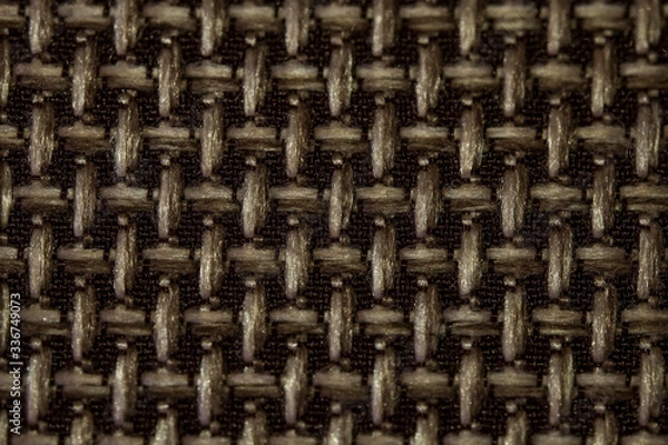 Fototapeta Fabric texture macro photo. Grunge texture. Fabric for furniture upholstery close-up. Rough weave of thick threads. Burlap close-up.