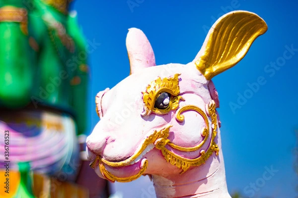 Fototapeta A beautiful view of buddhist temple Wat Saeng Kaew at Chiang Rai, Thailand.
