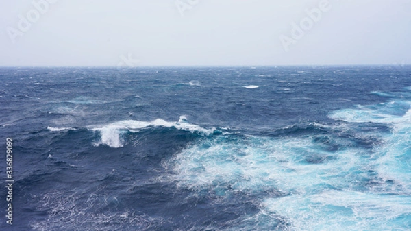 Fototapeta Stormy ocean, water splash, sea wave