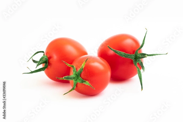 Obraz Fresh tomatoes with leaves on a white background. Tomatoes with full depth of coldness
