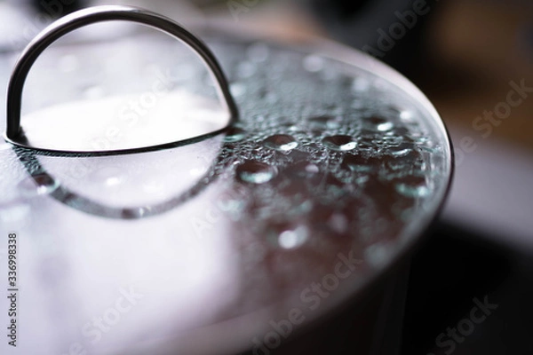 Obraz water drops on cooking pot